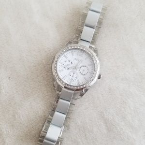 silver and clear relic watch